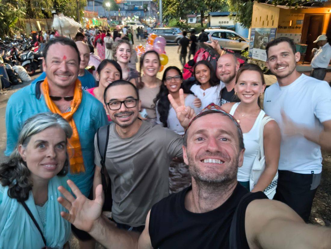 A big group selfie on a Pokhara street