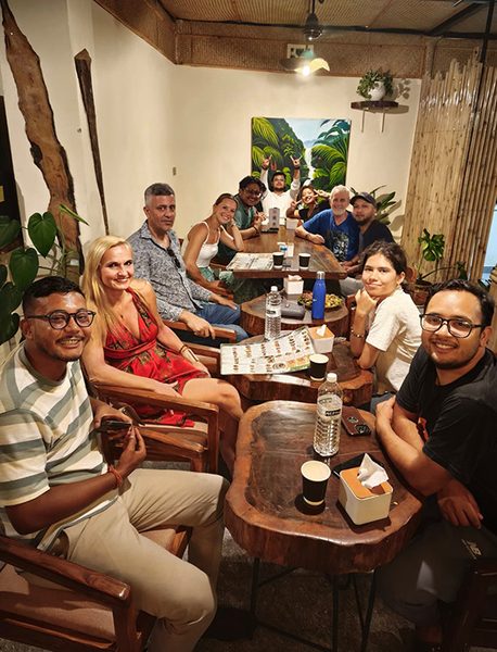 Guests around a cafe table