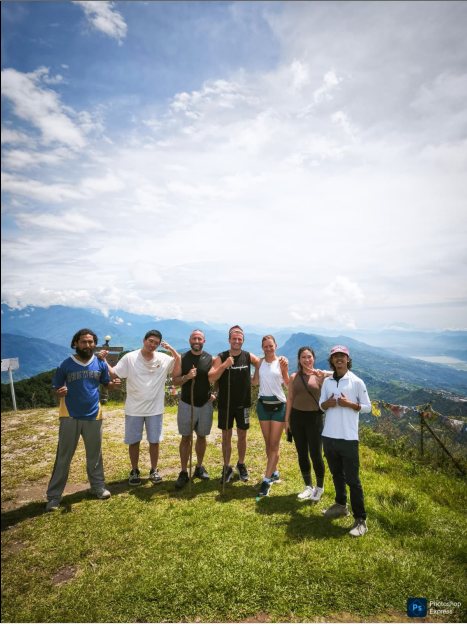 Group hiking mountain trail Pokhara Nepal