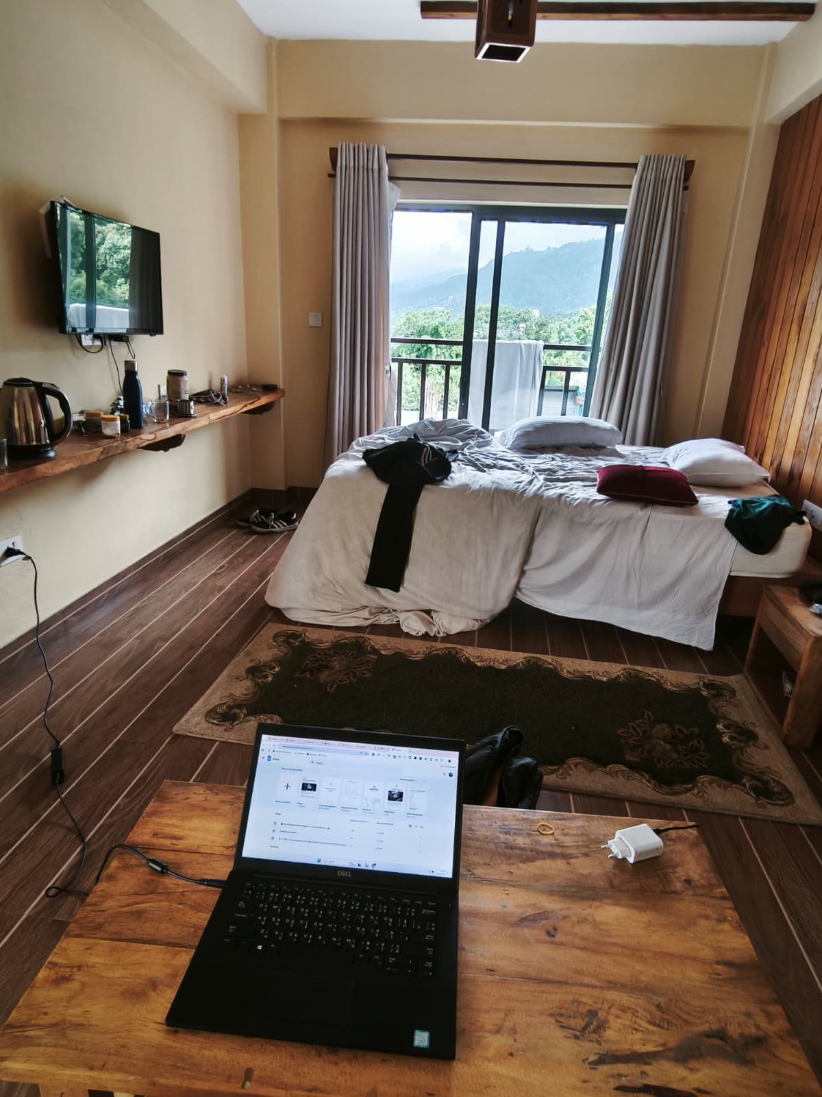 Workspace desk with laptop and mountain view Pokhara Nepal
